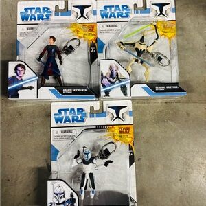 Pack of 3 Star Wars Clone Wars Action Figures - Blue, White, and Black.
